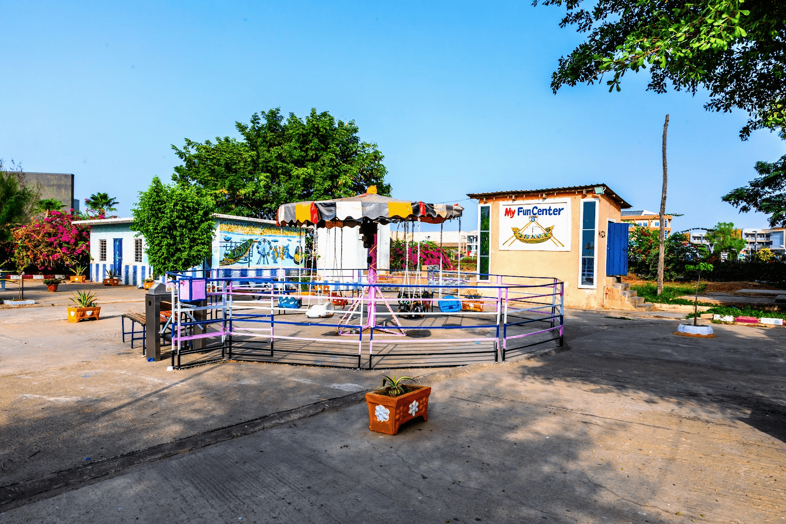 My Fun Center, one of ABM Mall's play attractions, with a small carousel ride out front